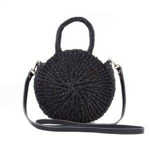 Clare V. Woven Circle Crossbody bag. Black rattan.